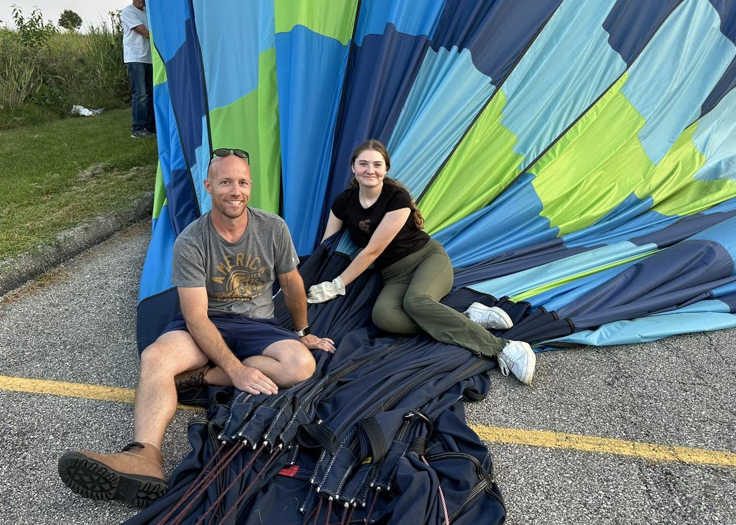 Buzzard's Glory crew working together with the balloon envelope