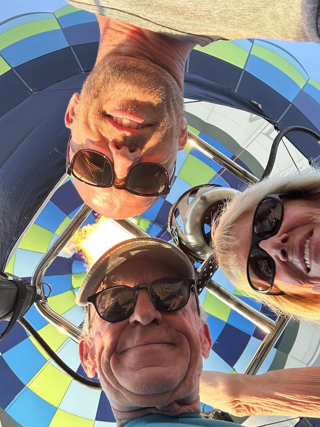 Friends sharing the balloon basket during the anniversary flight